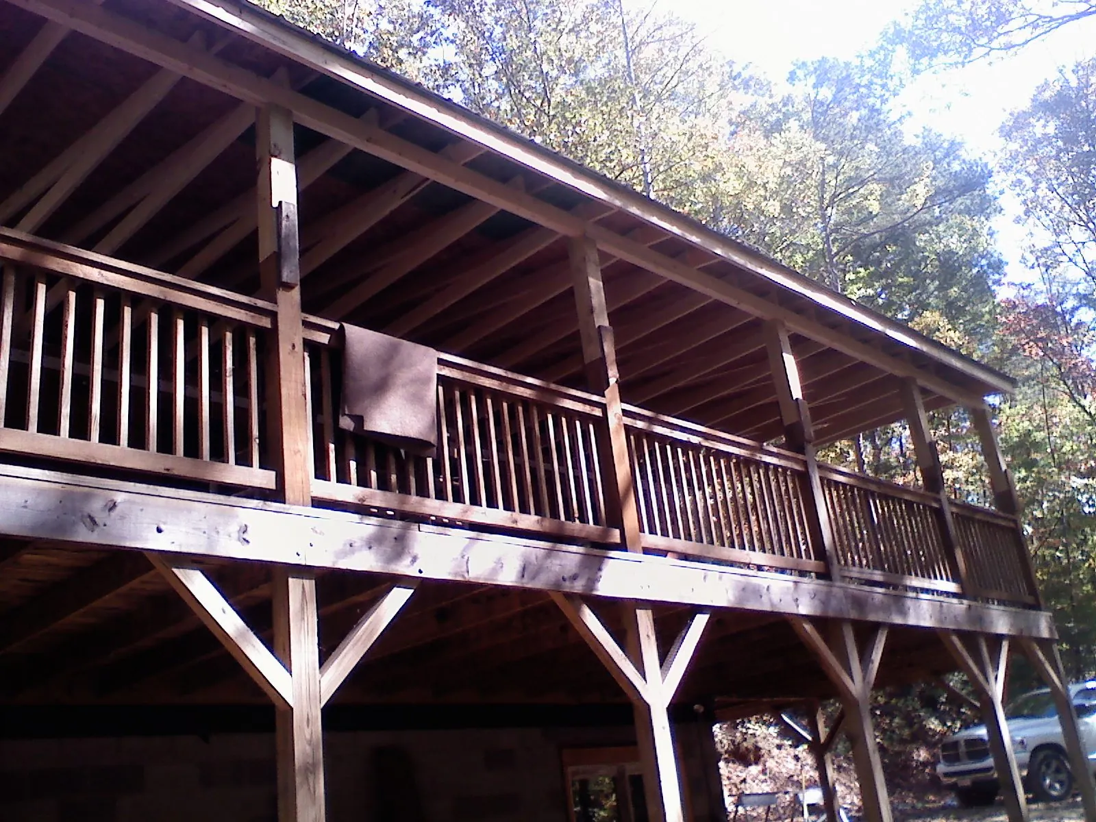 Timber framing under a new elevated porch and deck — Roof Leak Repair in Bazine by Roofing Brothers